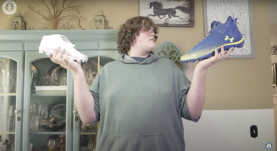 Eric Kilburn, Jr. compares his shoe size to the U.S. men's average in a Guinness World Records interview.