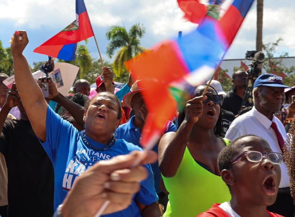 Pembroke Pines resident Audi Sicard of the Broward DNC board, left, joins in support of the South Florida Haitian community as Miami-Dade Democratic Haitian Caucus hosted a rally against the rhetoric of former President Donald Trump and running mate J.D. Vance, the importance of registration to vote, and participation in the election this November 5th on Sunday, September 22, 2024, in North Miami, Florida.