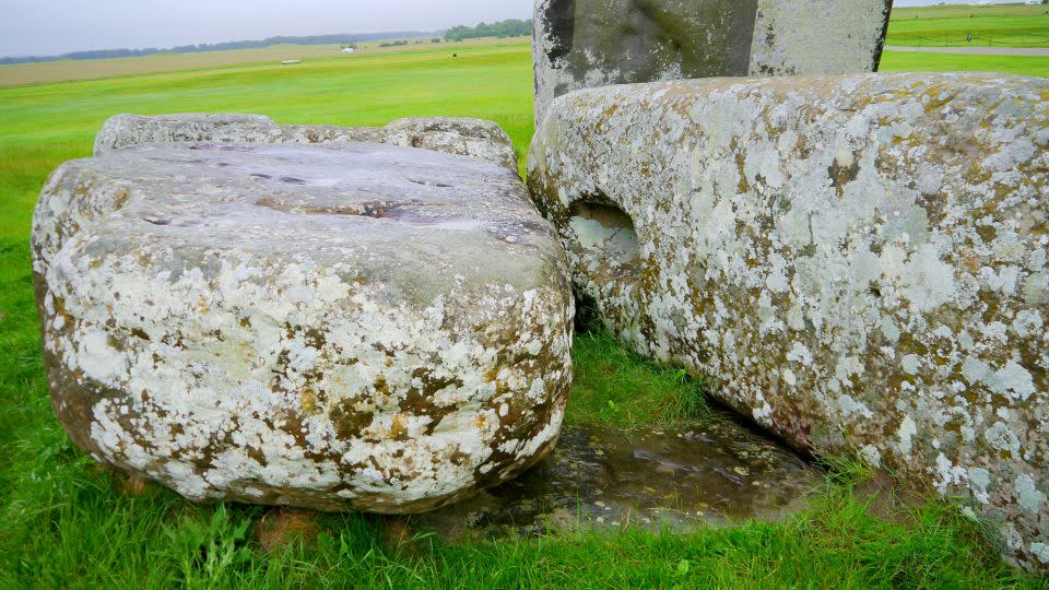 The Altar Stone can be seen underneath two bigger sarsen stones. - Nick Pearce/Aberystwyth University