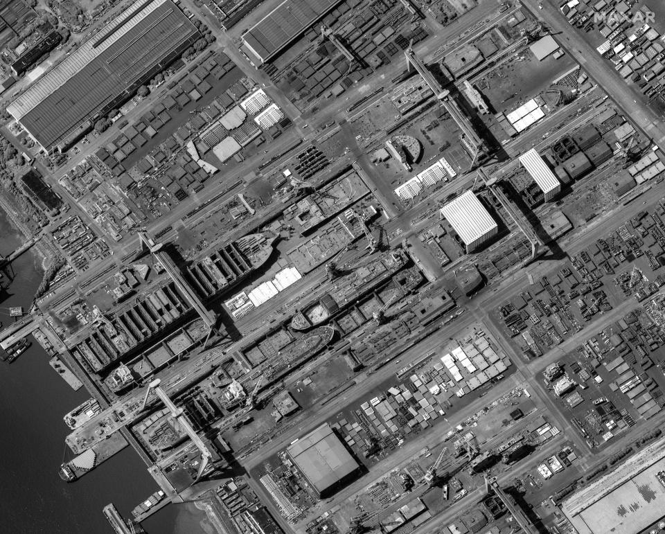 A black and white satellite image showing an overview of Jiangnan Shipyard and Chinese shipbuilding.