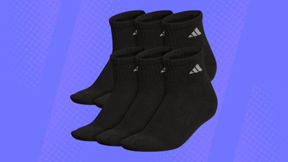 Six black Adidas ankle socks.