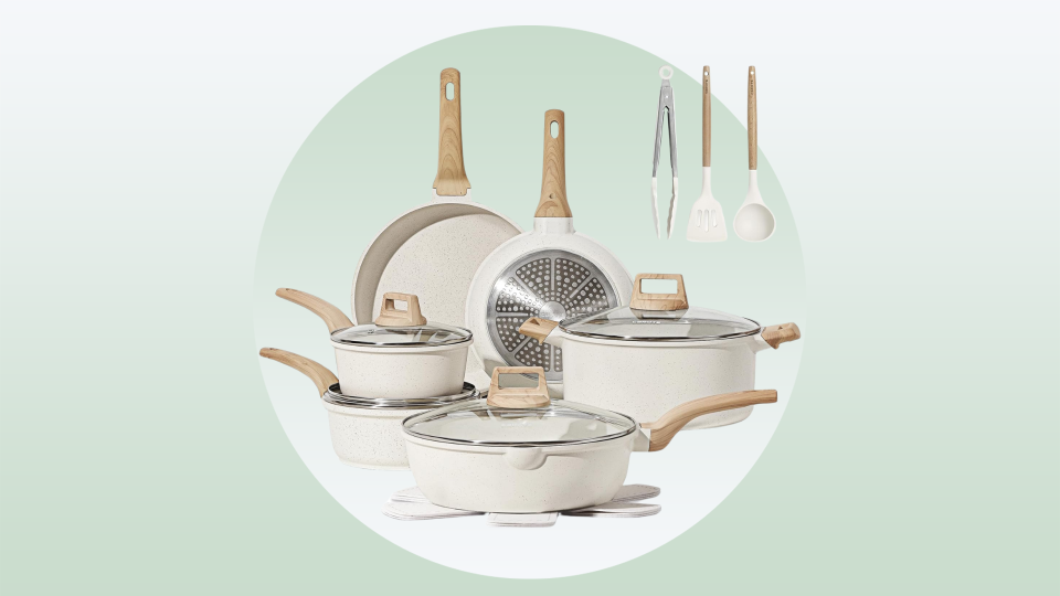 white carote cookware set on green background