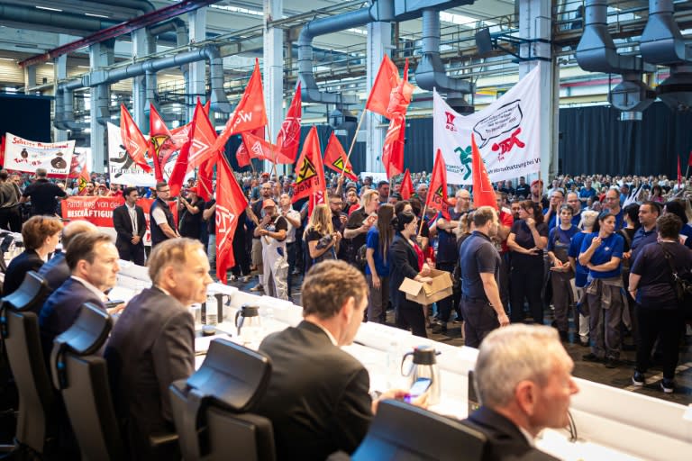 Employees of German car maker Volkswagen (VW) protest at the start of a company's general meeting in Wolfsburg, northern Germany, on September 4, 2024 (Moritz Frankenberg)