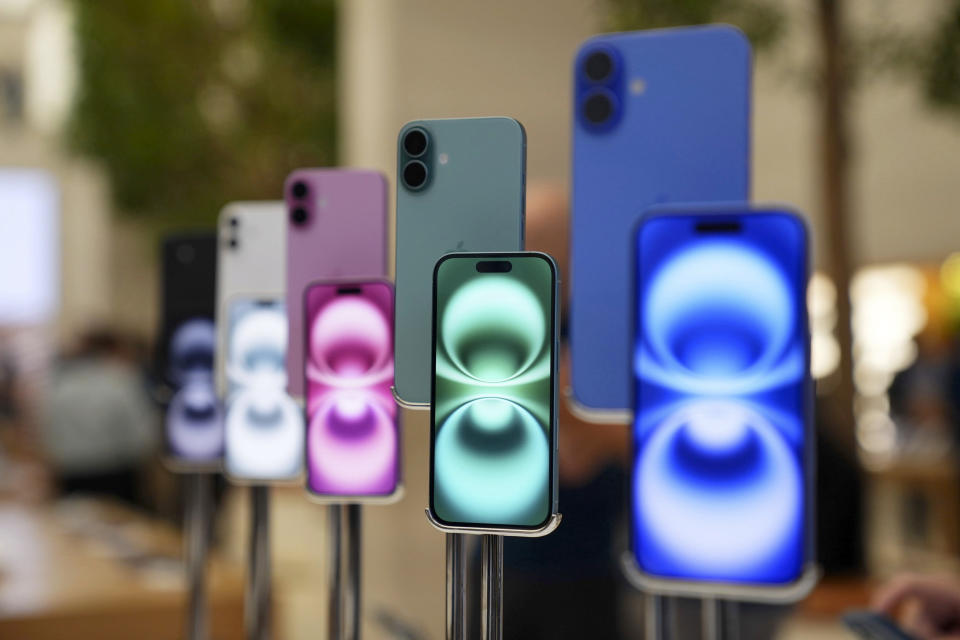 Models of iPhone 16 are on display at the Apple Store in Regent Street, central London, as the iPhone 16, 16 Plus, 16 Pro, 16 Pro Max go on sale, alongside other Apple Watch products, Friday, Sept. 20, 2024. (James Manning/PA via AP)