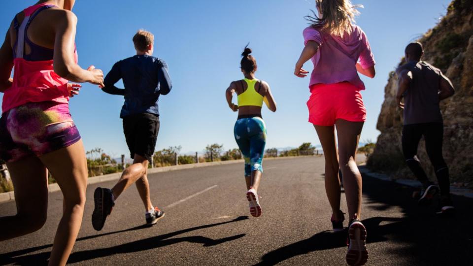 PHOTO: In this undated stock photo, a group of people are seen jogging together along a road.  (STOCK PHOTO/Getty Images)