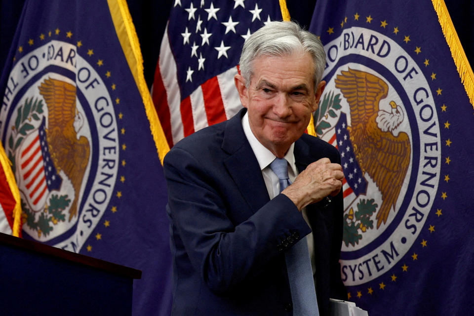 FILE PHOTO: Federal Reserve Board Chairman Jerome Powell leaves after a news conference at the Federal Reserve Building in Washington, U.S., December 14, 2022. REUTERS/Evelyn Hockstein/File Photo