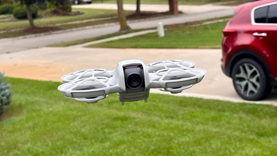 A photo of the DJI Neo in flight.