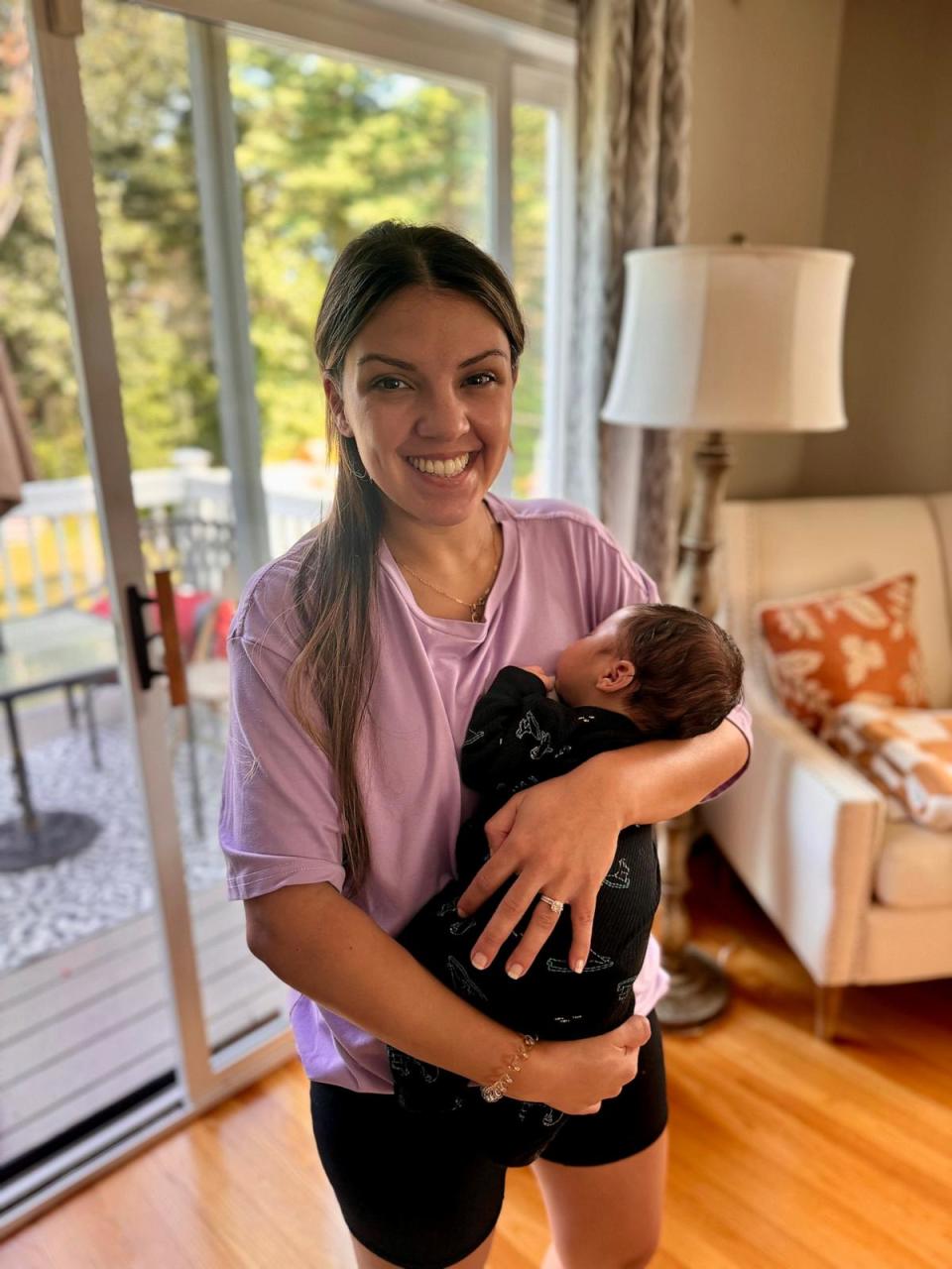 PHOTO: Monica Serra holds her son Roman. (UMass Memorial Health)