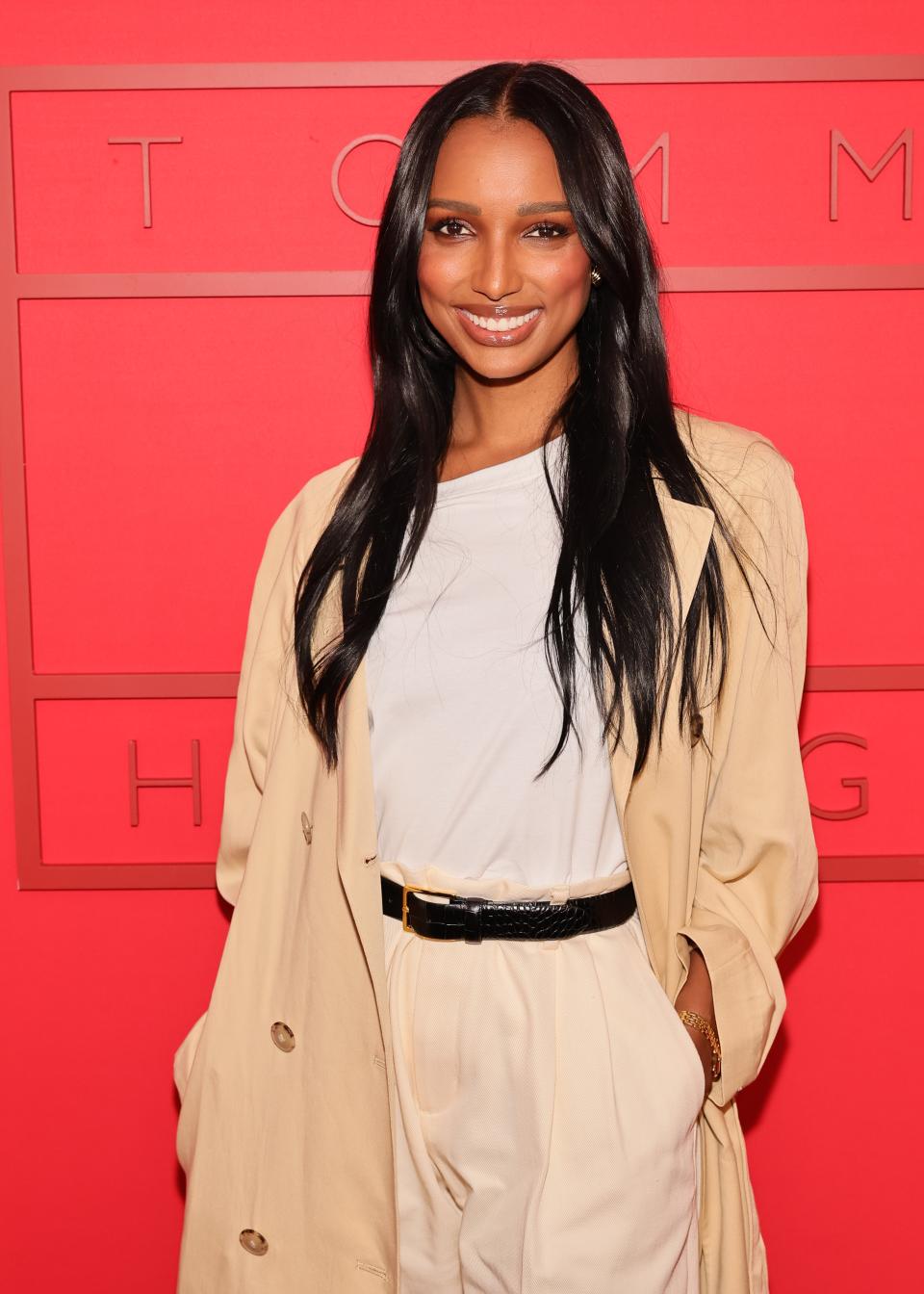 Jasmine Tookes at New York Fashion Week 2024, with long curtain bangs.