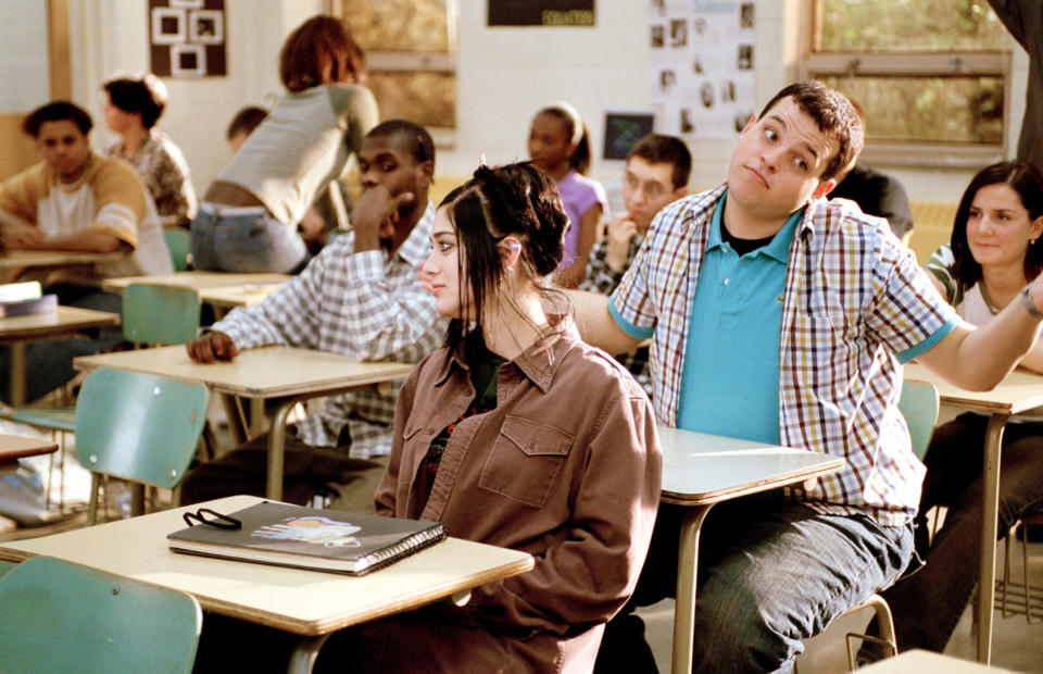 Lizzy Caplan and Daniel Franzese during a classroom scene in the 2004 classic.