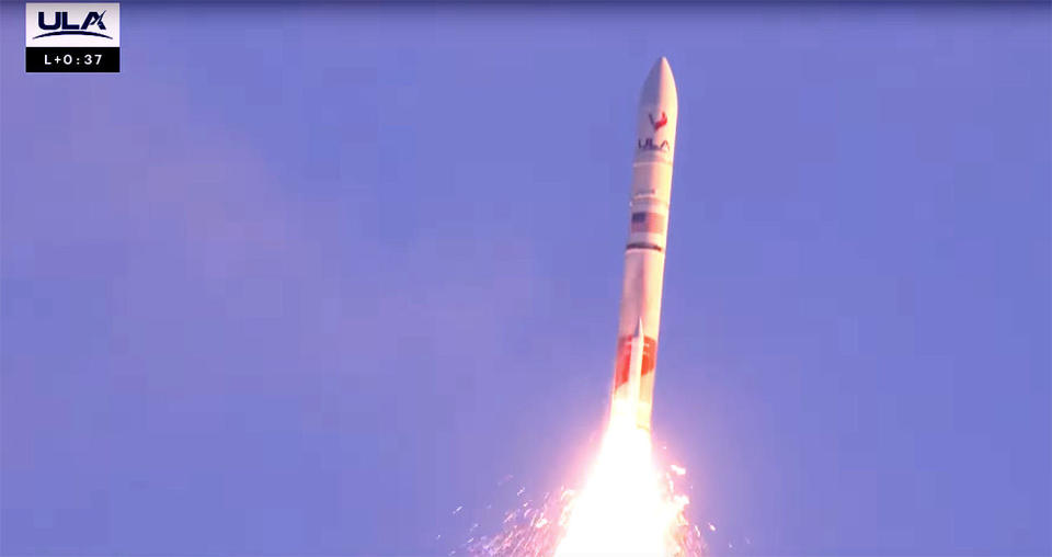 Thirty-seven seconds after liftoff, one of two strap-on solid fuel boosters suffered an anomaly of sorts as can be seen by sparks and debris falling away from the rocket. / Credit: ULA