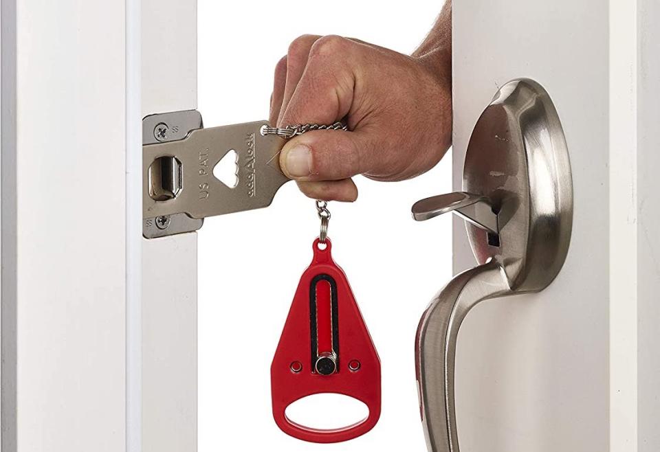 image of someone unlocking door and installing the Addalock