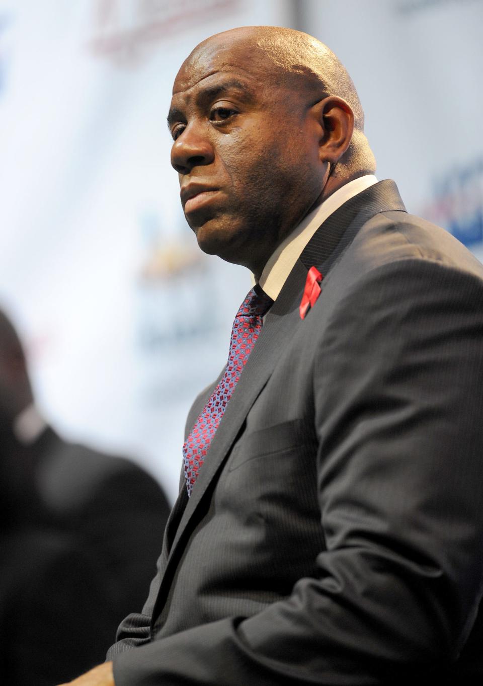 Former NBA star Earvin "Magic" Johnson at a November 2011 press conference held by the Magic Johnson Foundation at Staples Center, 20 years to the date the former Los Angeles Laker announced his HIV status and retirement from the NBA.