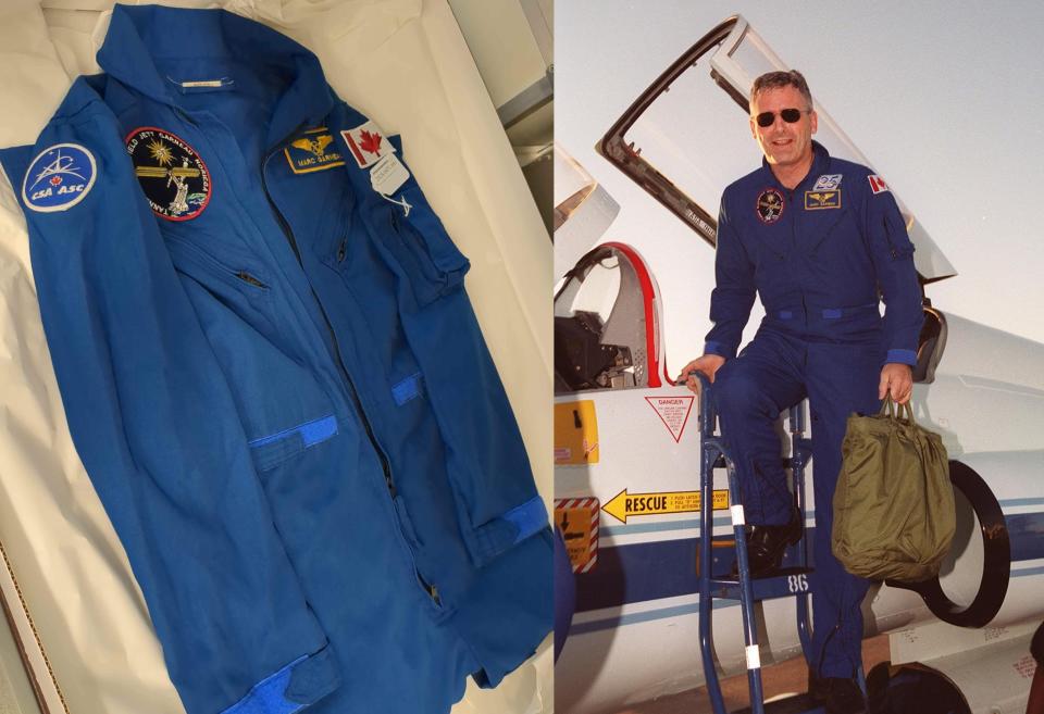 two images side by side. at left is a flight suit in a box. at right is astronaut marc garneau stepping out of a plane wearing the flight suit