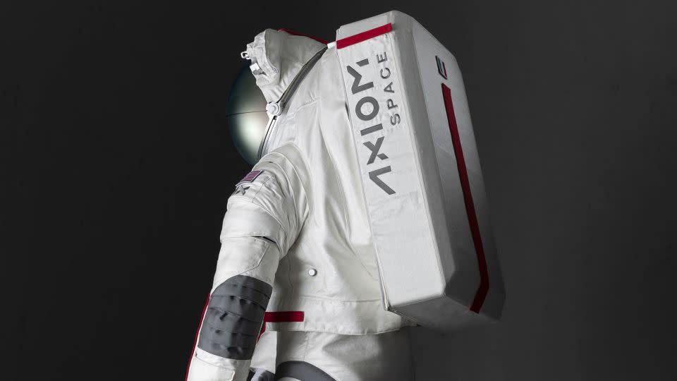 The spacesuit is made from a white material that reflects heat and protects astronauts from extreme high temperatures and lunar dust. - Prada & Axiom Space