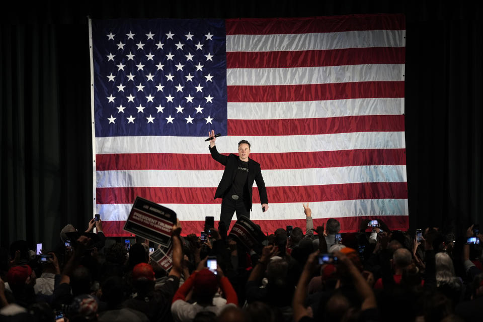 Elon Musk speaks as part of a campaign town hall in support of Republican presidential nominee former President Donald Trump in Folsom, Pa., Thursday, Oct. 17, 2024. (AP Photo/Matt Rourke)