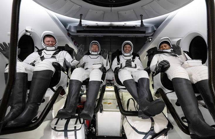 Safely aboard SpaceX's recovery ship, the Crew 8 fliers smiled for the camera before they were carried out of the spacecraft for initial medical checks, beginning their re-adjustment to gravity after nearly eight months in weightlessness.  Left to right: cosmonaut Alexander Grebenkin, co-pilot Matthew Barratt, commander Matthew Dominick and astronaut Jeanette Epps.  / Credit: NASA