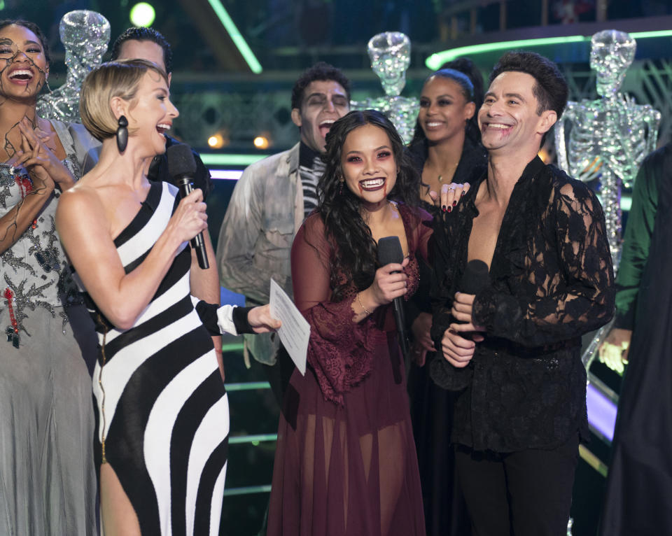 Cohost Julianne Hough speaks to Jenn Tran and Sasha Farber after their performance to Olivia Rodrigo's 