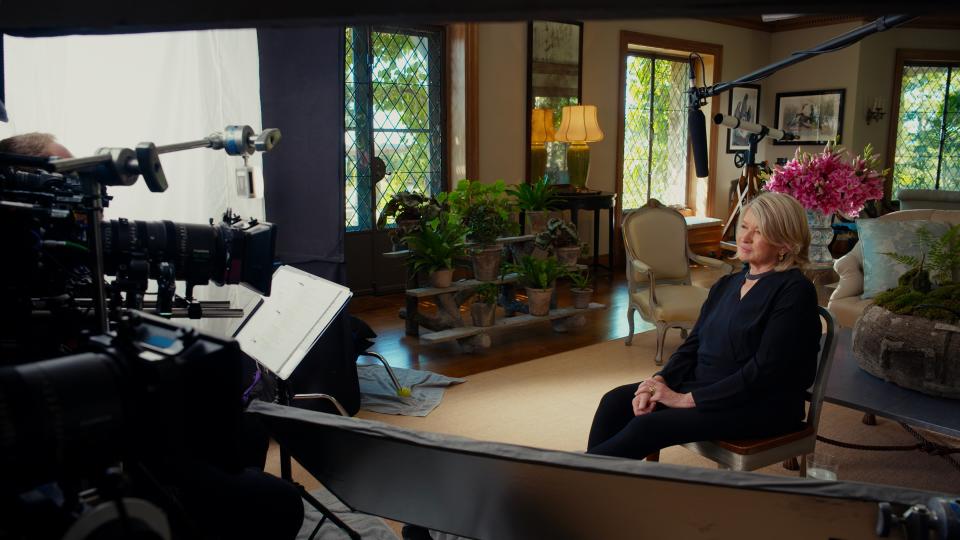 Cutler, behind the camera, interviewing Stewart in her home for Martha.