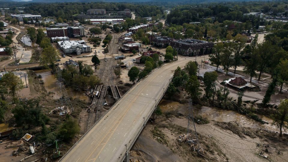 Mud and debris cover Asheville, North Carolina, on September 30, 2024 in the aftermath of Hurricane Helene's flooding. - Mike Stewart/AP