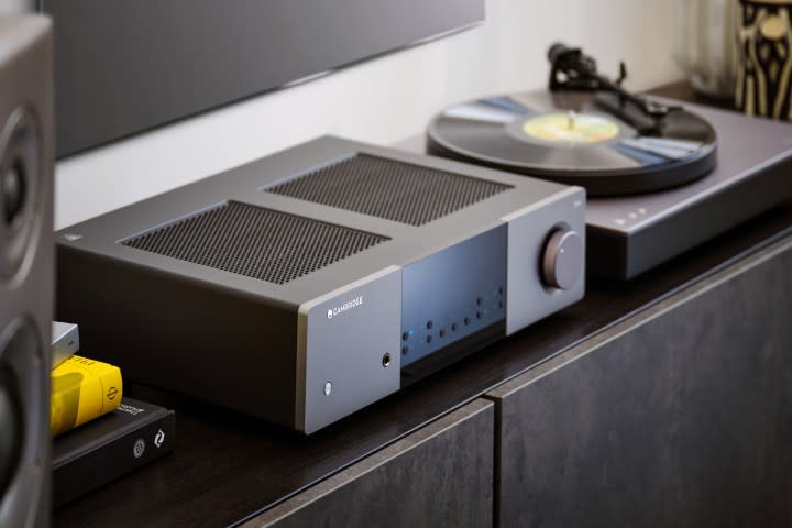 The Cambridge Audio EXA100 Stereo Integrated Amplifier with a turntable.