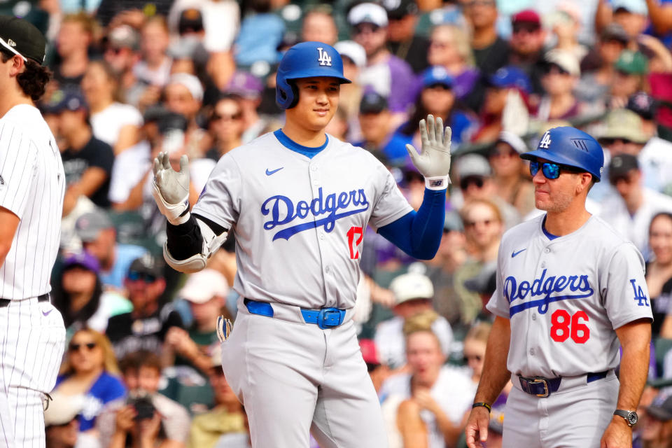 Sep 29, 2024; Denver, Colorado, USA; Los Angeles Dodgers designated hitter Shohei Ohtani (17) celebrates his single during the eighth inning against the Colorado Rockies at Coors Field. Mandatory Credit: Ron Chenoy-Imagn Images