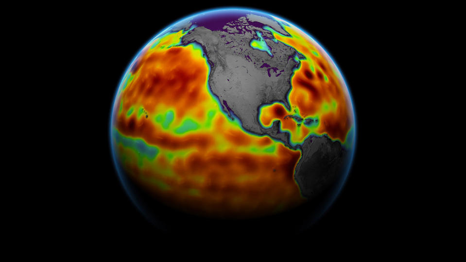  A thermal image of earth with grey land masses and colorful oceans. 