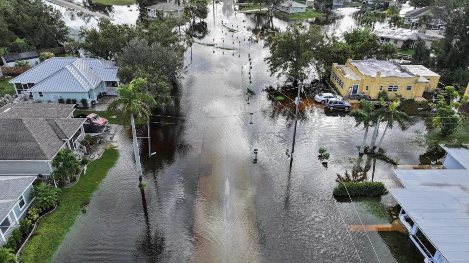 PHOTO: In this aerial view, flood waters inundate a neighborhood after Hurricane Milton came ashore on Oct. 10, 2024, in Punta Gorda, Fla. (Joe Raedle/Getty Images)