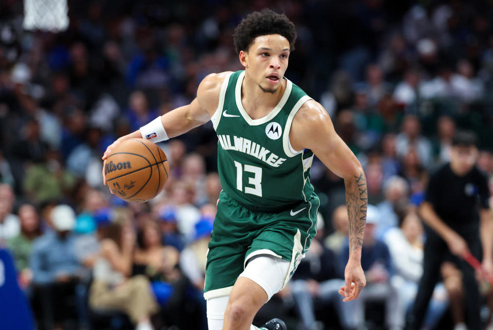 Oct 17, 2024; Dallas, Texas, USA;  Milwaukee Bucks guard Ryan Rollins (13) dribbles during the second half against the Dallas Mavericks at American Airlines Center. Mandatory Credit: Kevin Jairaj-Imagn Images