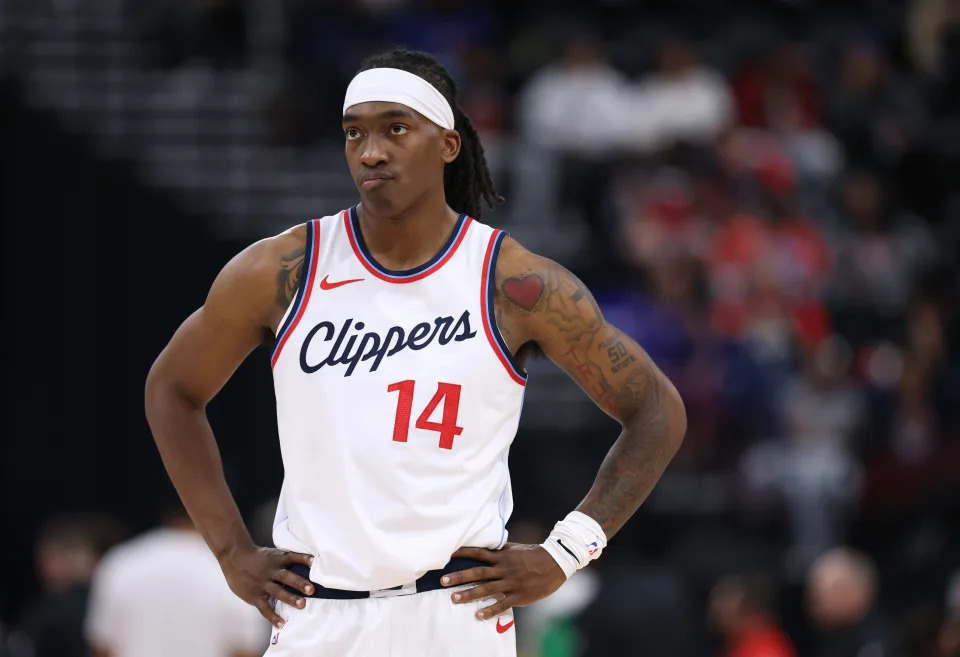 INGLEWOOD, CALIFORNIA - OCTOBER 17: Terance Mann #14 of the LA Clippers waits during a 113-91 Clippers win over the Sacramento Kings in a pre-season game at Intuit Dome on October 17, 2024 in Inglewood, California. (Photo by Harry How/Getty Images)