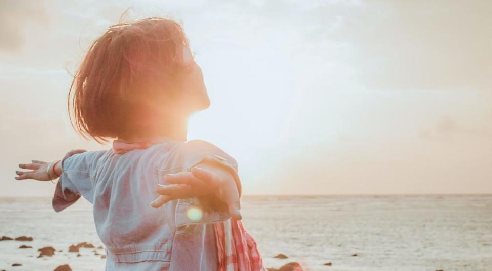 A senior woman at sunset, representing the cohort of senior women.