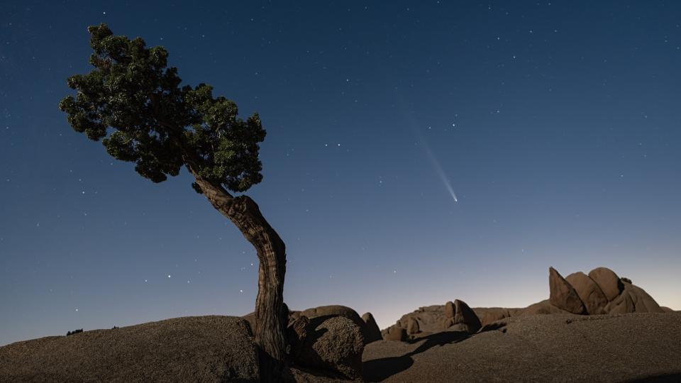  A bright white, fuzzy streak in the night sky. 