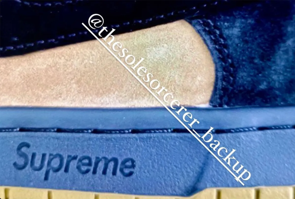 Supreme x Nike SB Dunk Low in navy/tan. Credit: @thesolesorcerer_backup