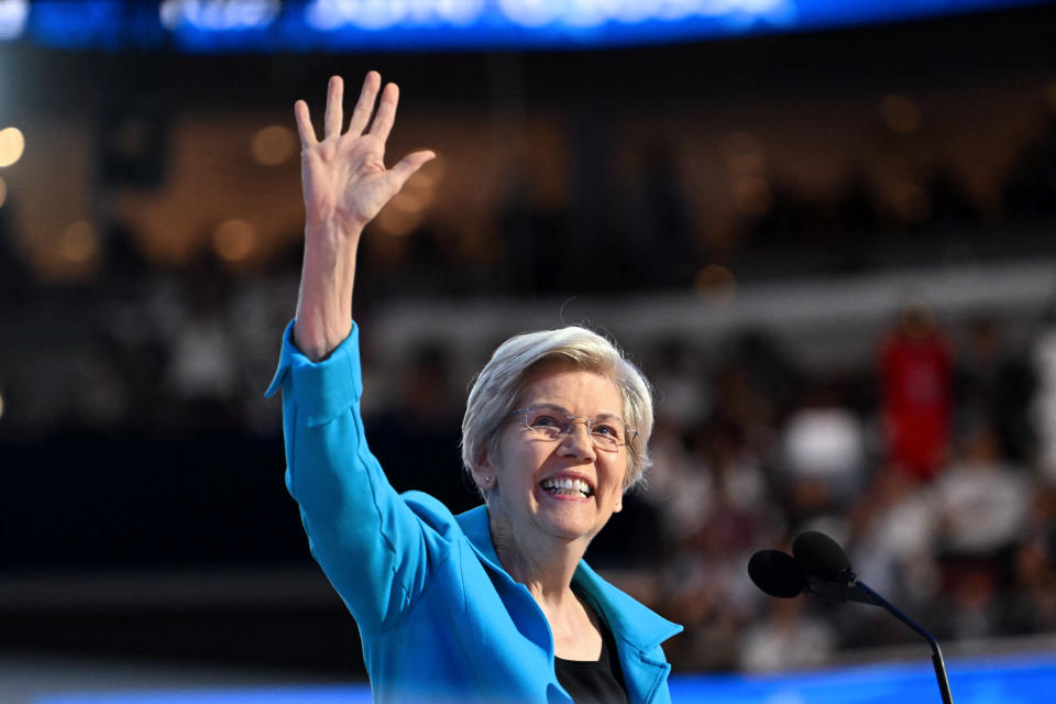 US Senator from Massachusetts Elizabeth Warren waves as she speaks on the fourth and last day of the Democratic National Convention (DNC) at the United Center in Chicago, Illinois, on August 22, 2024. Vice President Kamala Harris will formally accept the party's nomination for president today at the DNC which ran from August 19-22 in Chicago. (Photo by ANDREW CABALLERO-REYNOLDS / AFP) (Photo by ANDREW CABALLERO-REYNOLDS/AFP via Getty Images)