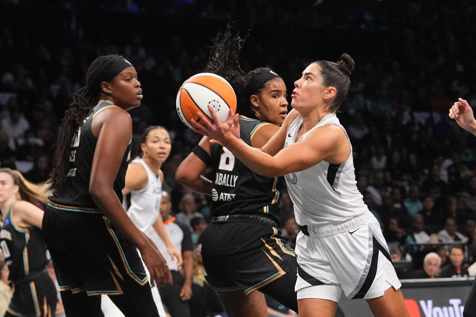 Sep 29, 2024; Brooklyn, New York, USA; Las Vegas Aces guard Kelsey Plum (10) shoots a layup against the New York Liberty during game one of the 2024 WNBA Semi-finals at Barclays Center. Mandatory Credit: Gregory Fisher-Imagn Images