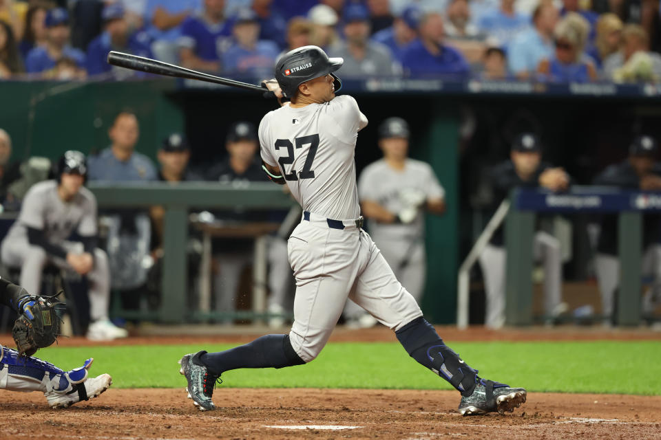 KANSAS CITY, MO - OCTOBER 10: New York Yankees designated hitter Giancarlo Stanton (27) takes a swing in the sixth inning of game 4 of the ALDS between the New York Yankees and Kansas City Royals on October 10, 2024 at Kauffman Stadium in Kansas City, MO. (Photo by Scott Winters/Icon Sportswire via Getty Images)