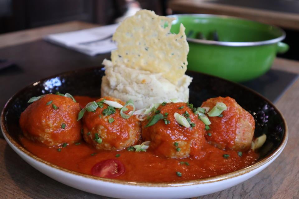 Belgian home-cooked style Boulettes (meatballs stew with tomatoes) at a restaurant in Bruges, Belgium