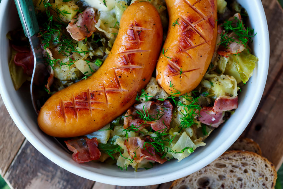 Irish cabbage Colcannon with sausages . .selective focus