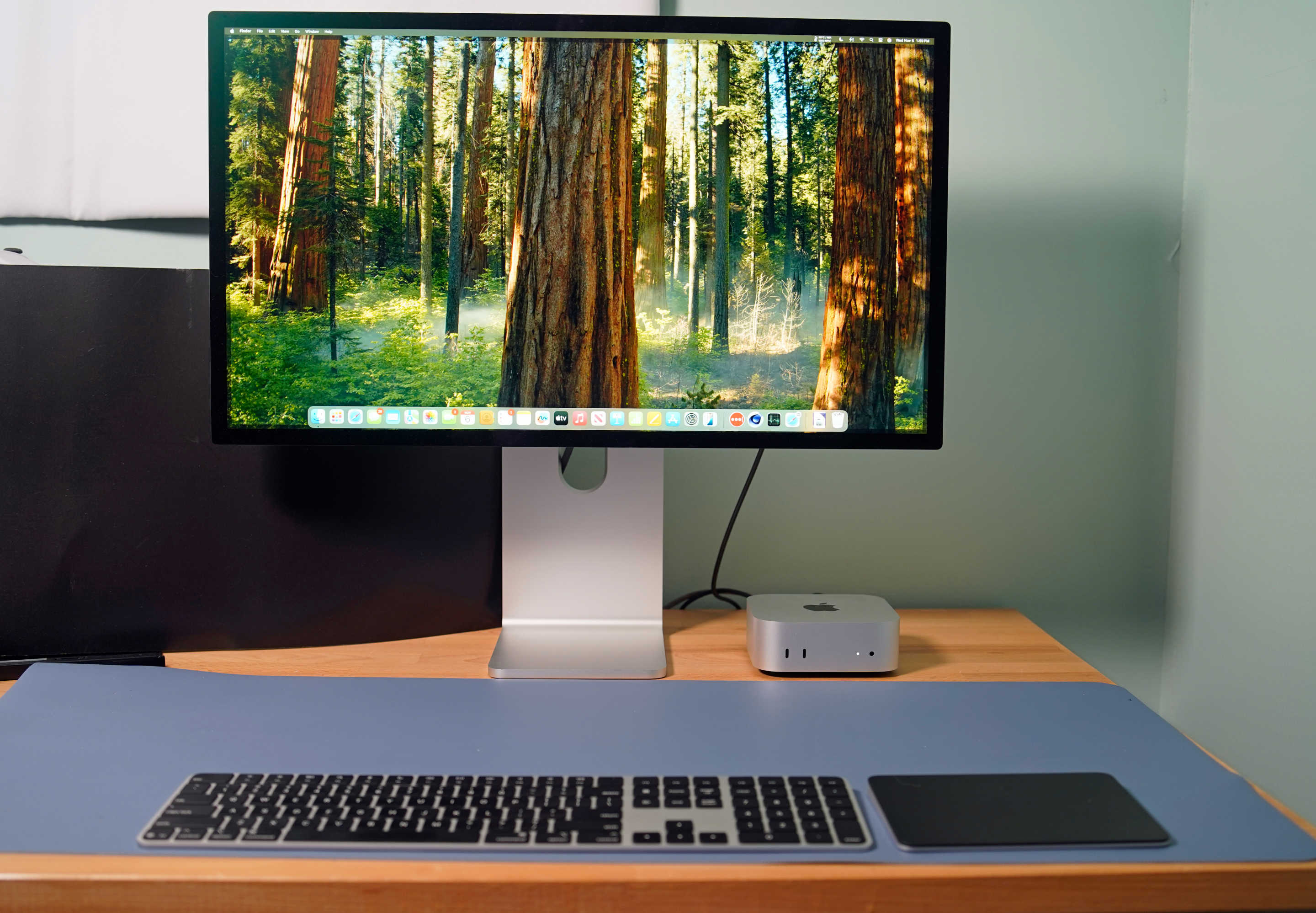 Apple Mac mini (2024) alongside a Studio Display