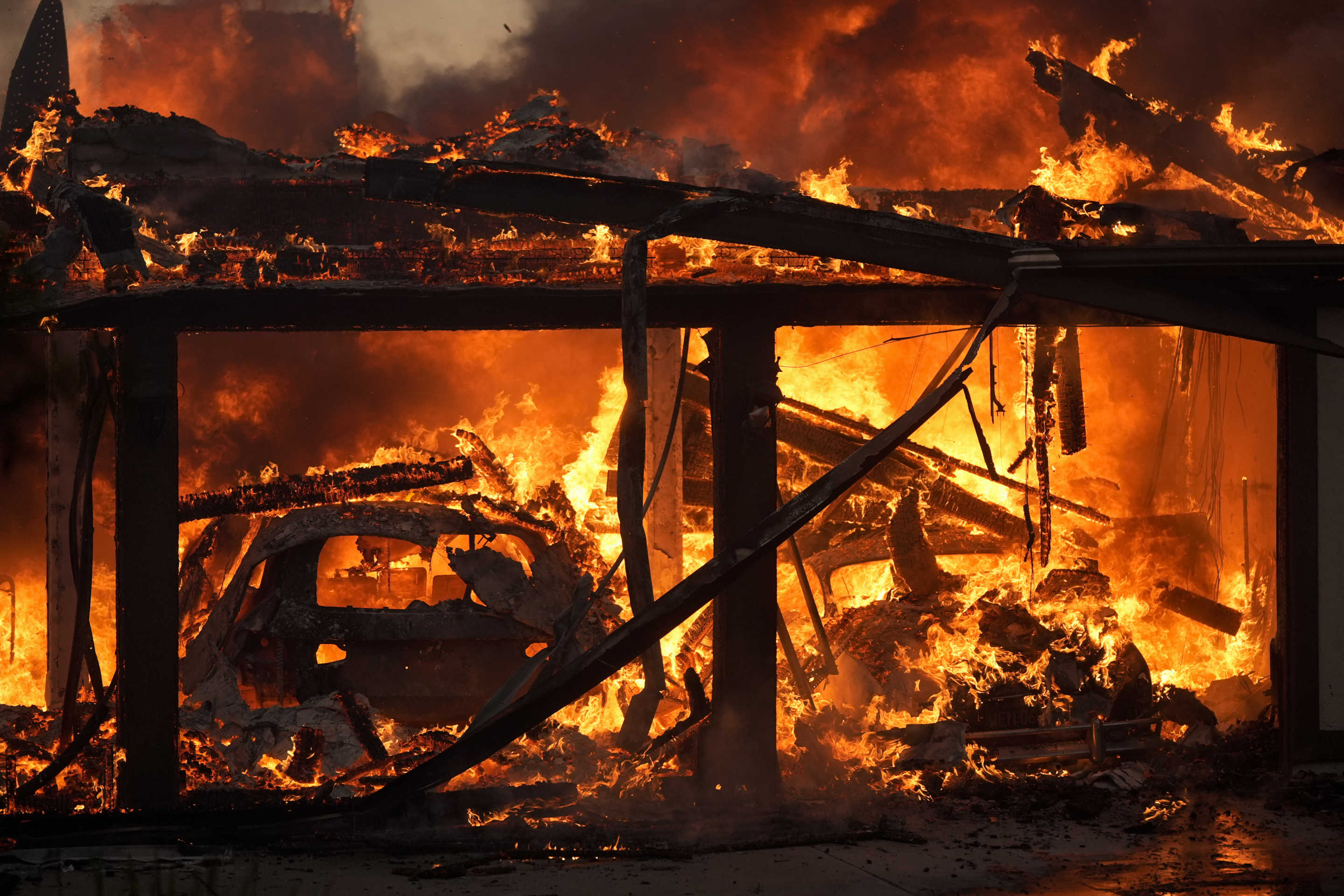 A home in Camarillo, Calif., burns in the Mountain Fire.