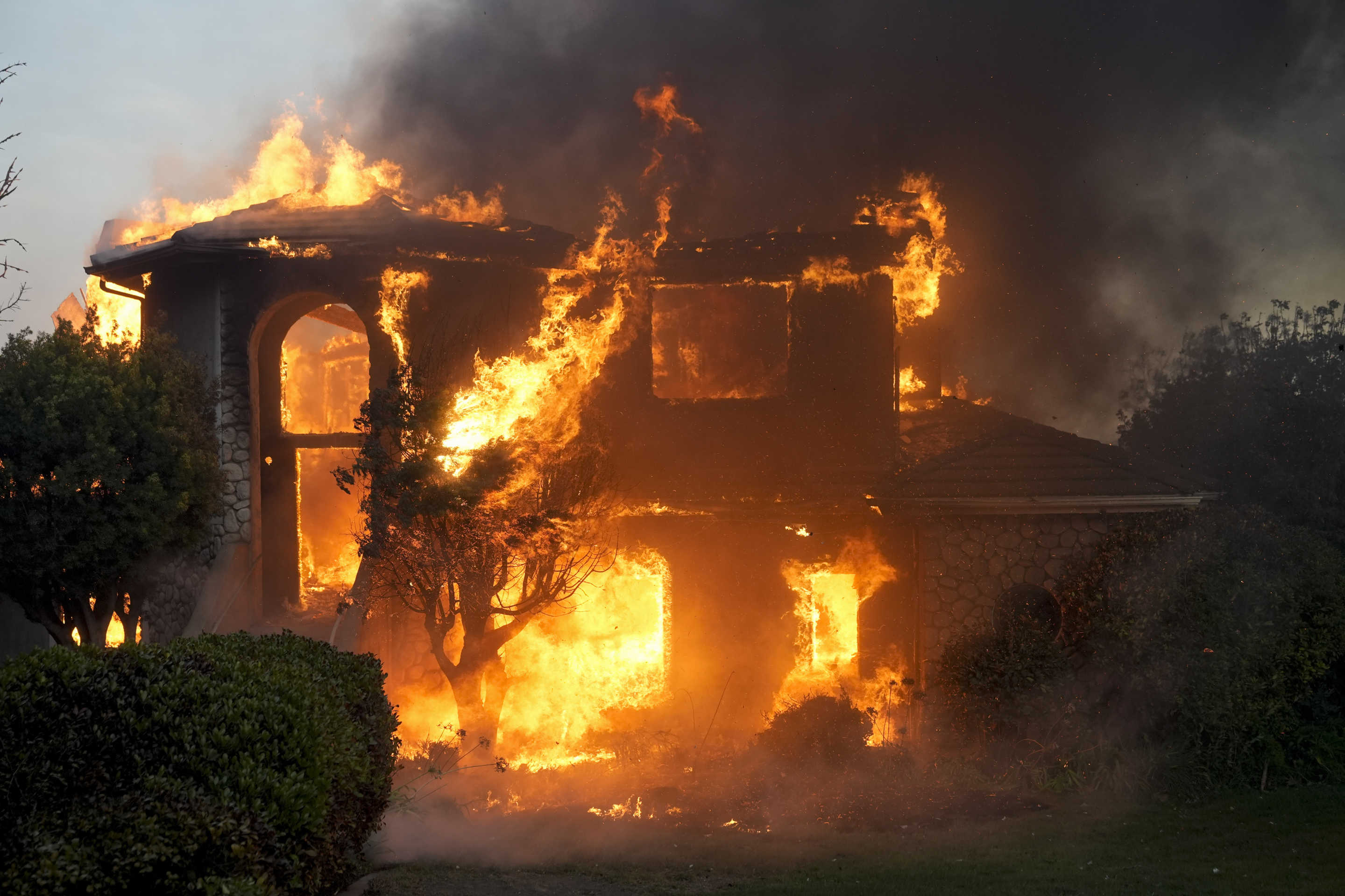 A two-story house in Camarillo, Calif., completely engulfed in flames on Wednesday. 