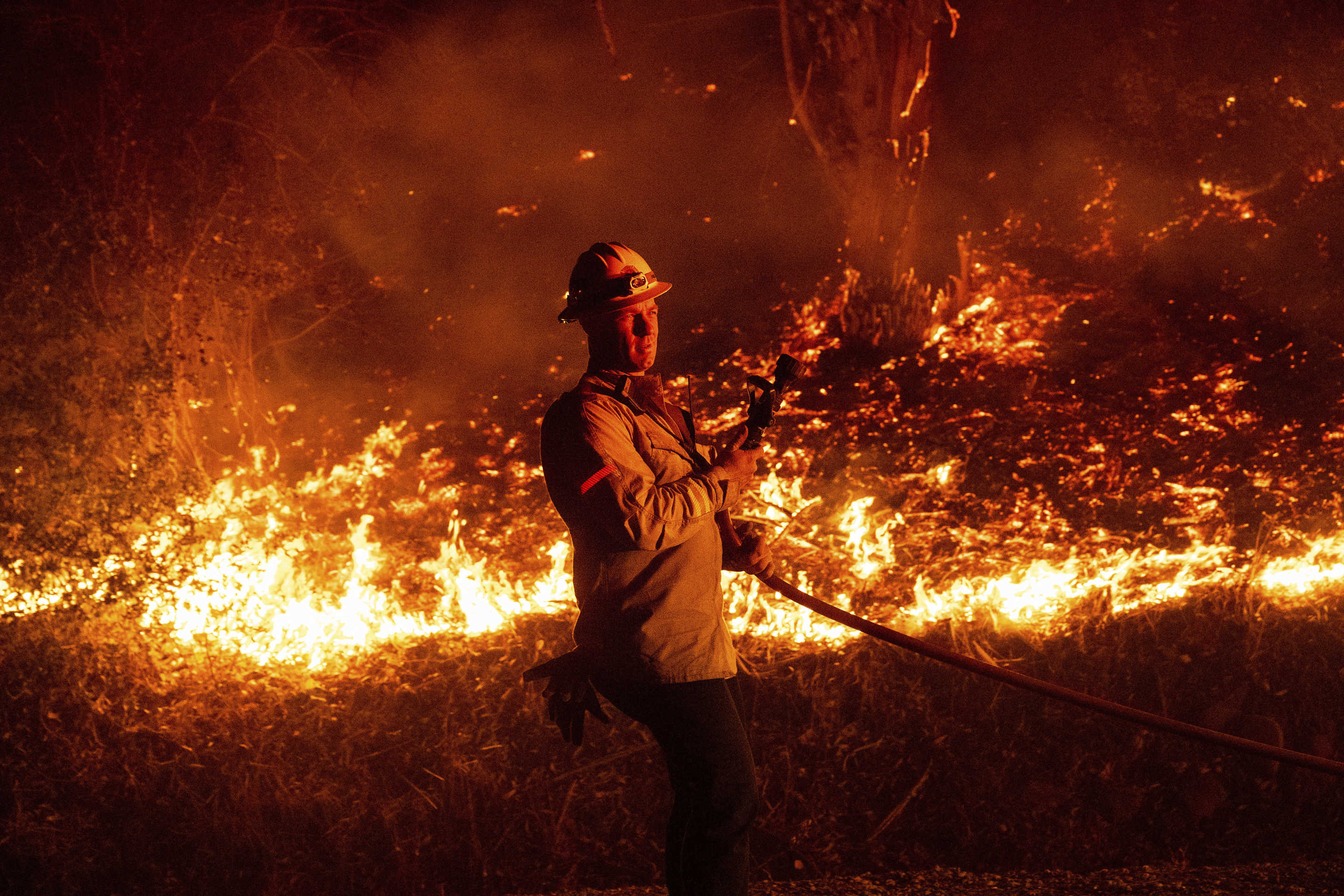 A firefighter in Santa Paula, Calif., battling the Mountain Fire on Wednesday. 