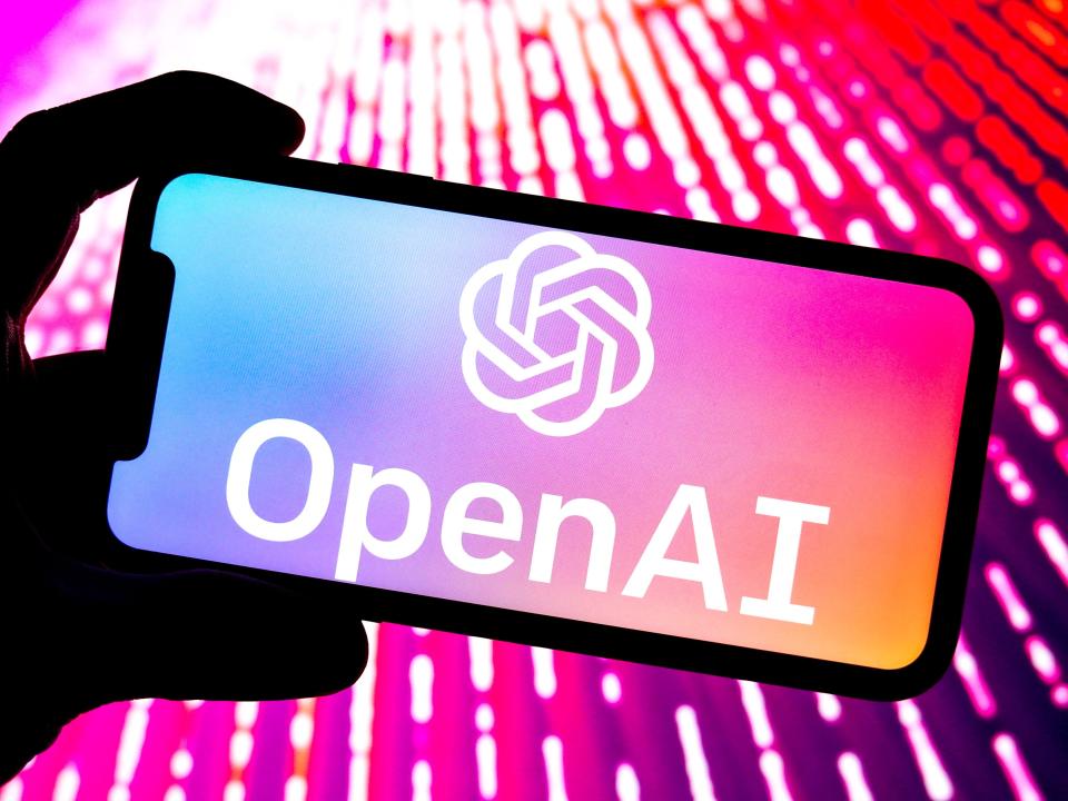 Phone with the OpenAI logo