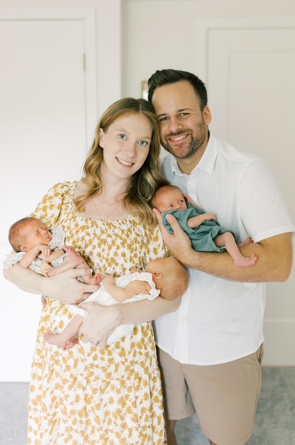 Sadie and her husband after bringing their triplets home. 