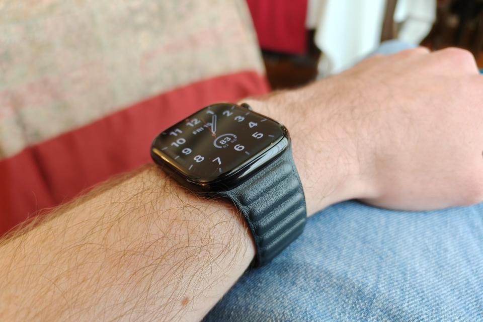 The Apple Watch Series 10, with a leather band, on someone's wrist.