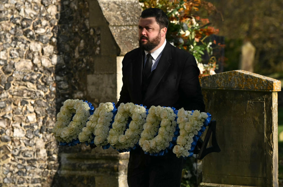 Flowers are carried into the church ahead of the funeral service of the late One Direction singer Liam Payne on Thursday.