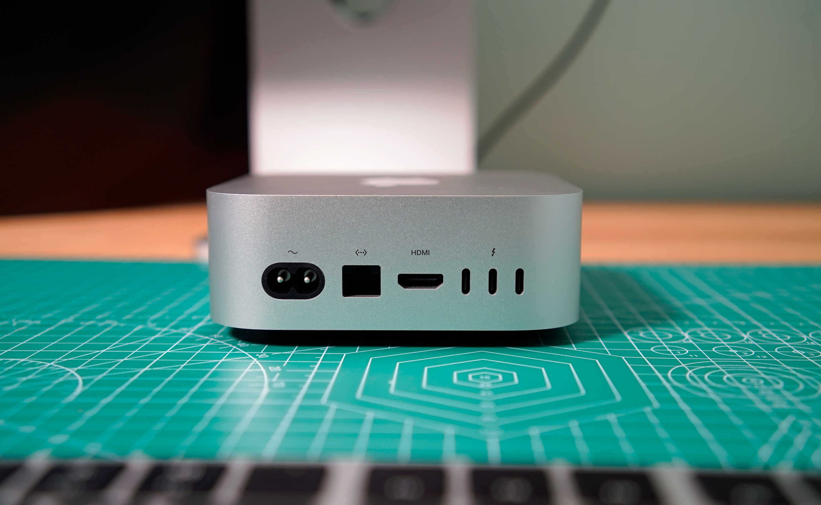 Apple Mac mini (2024) rear ports: Power, Ethernet, HDMI and three USB-C Thunderbolt 5 connections.