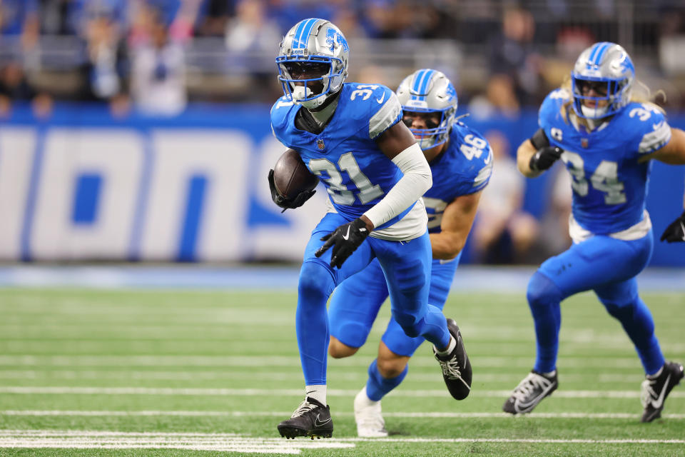 DETROIT, MICHIGAN - OCTOBER 27: Kerby Joseph #31 of the Detroit Lions intercepts a pass while playing the Tennessee Titans at Ford Field on October 27, 2024 in Detroit, Michigan. (Photo by Gregory Shamus/Getty Images)