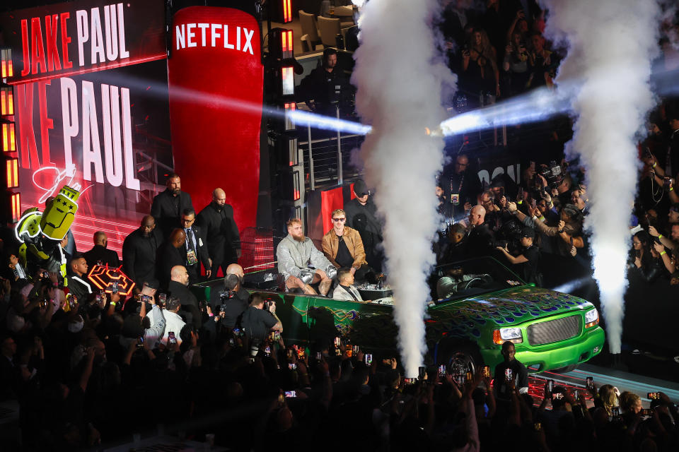 Jake Paul arrives in a car to the ring before his match with Mike Tyson for their heavyweight world titles of the Premiere Boxing Championship on Friday night at AT&T Stadium in Arlington, Texas.