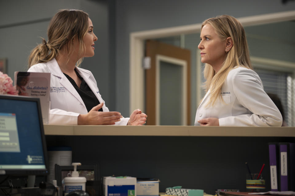 Luddington and Capshaw speak to each other in the hospital in a scene from Grey's Anatomy. 